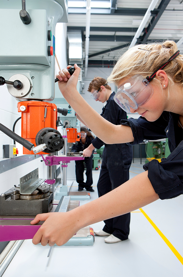 Girl in goggles working